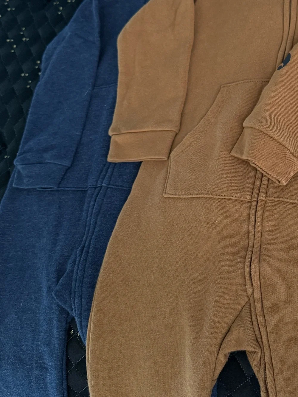 Two Carhartt Kids Hooded Zip One-Pieces in Carhartt Brown and dark navy